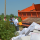 Image for article titled Photos: Russian officials use a 45-ton bulldozer to flatten illegal Western cheeses